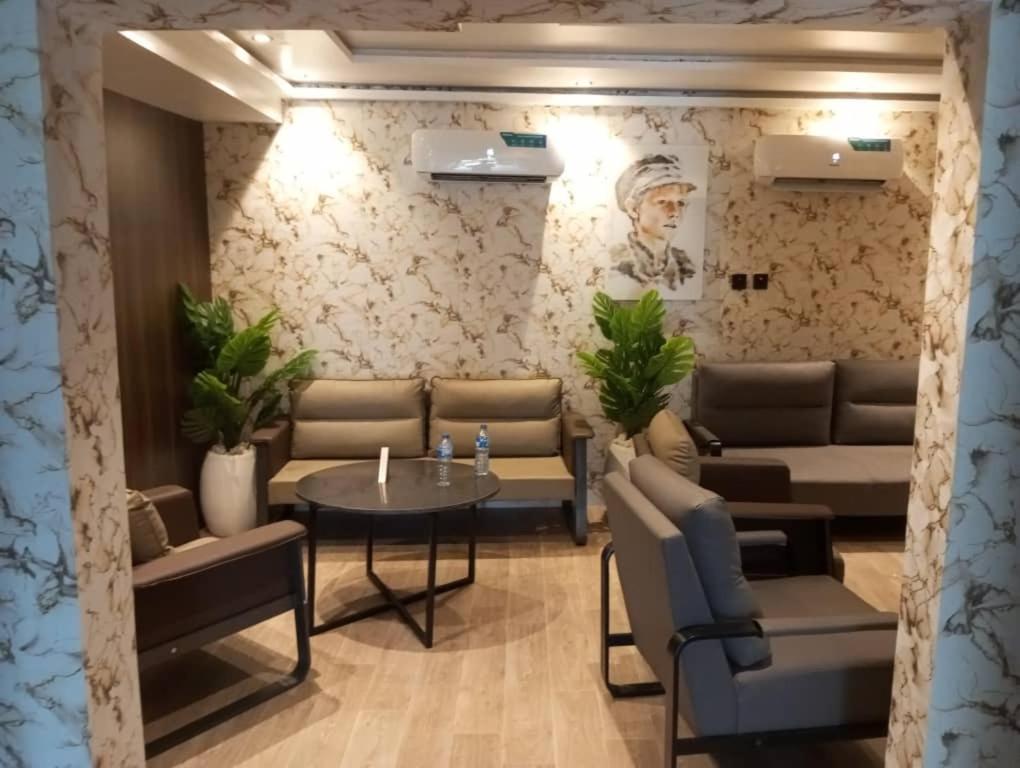 Posezení v ubytování Enzo Apartments