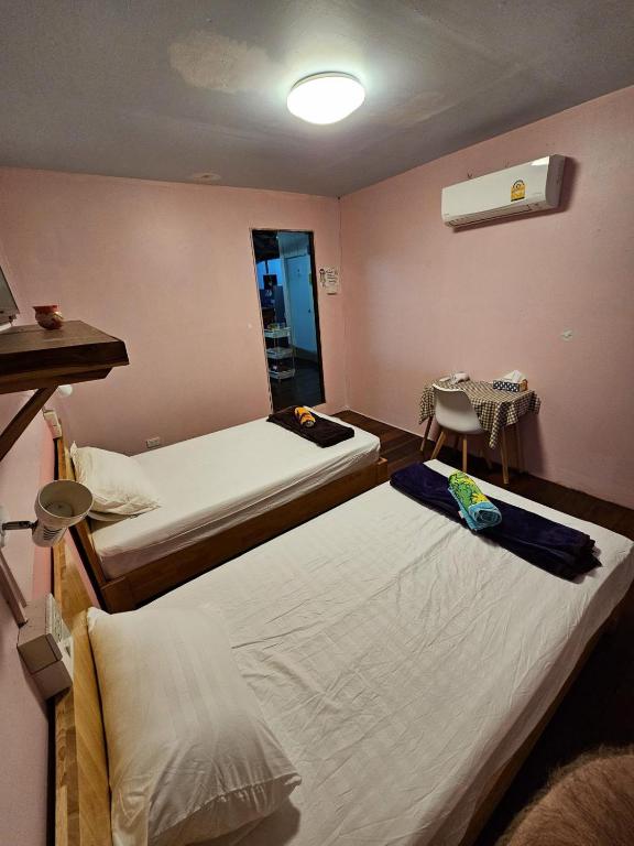 Postel nebo postele na pokoji v ubytování Let's Sea Hostel