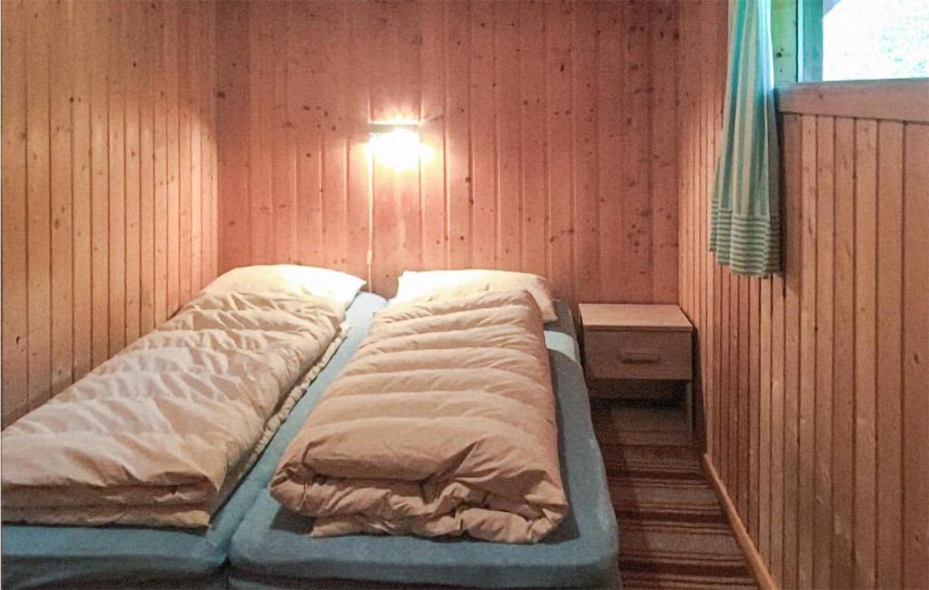 Postel nebo postele na pokoji v ubytování Flåten Hyttegrend