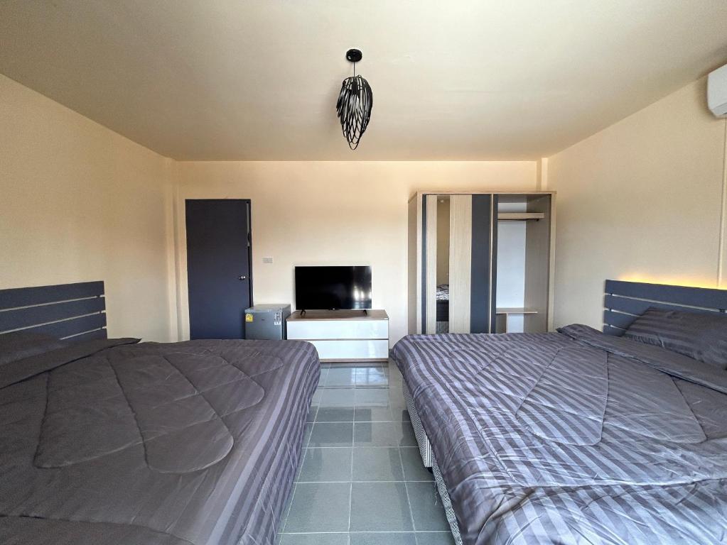 Postel nebo postele na pokoji v ubytování Krabi Greenday Hostel and Glamping