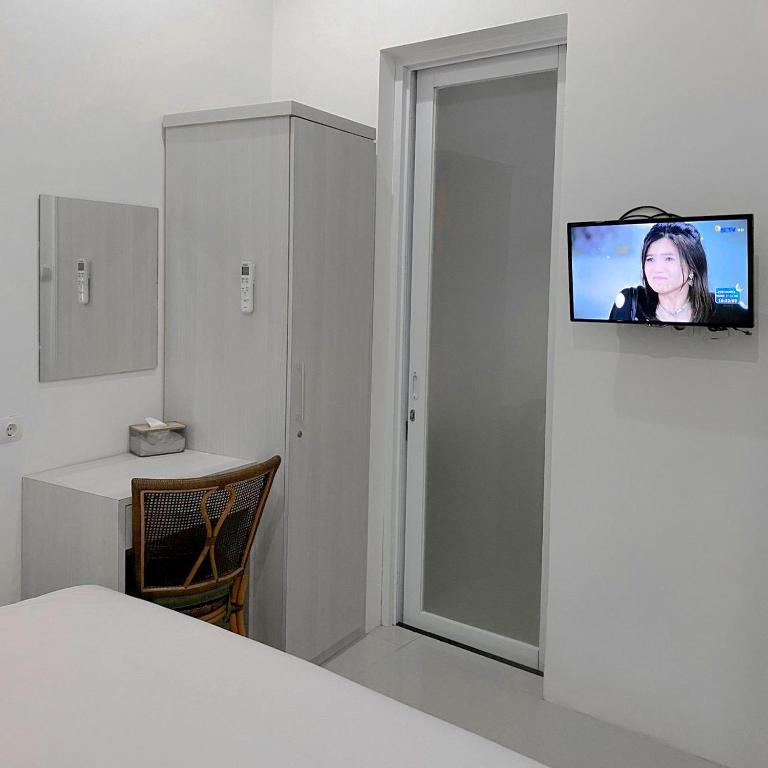 TV a/nebo společenská místnost v ubytování Binumar Guest House