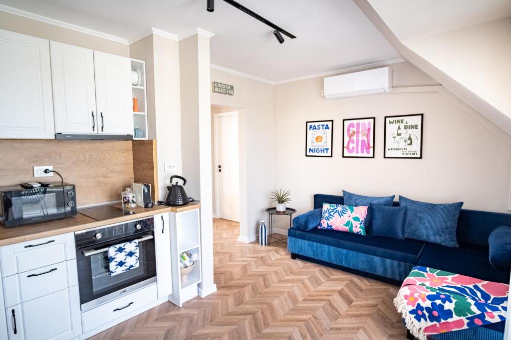 Kuchyň nebo kuchyňský kout v ubytování Sunny River Loft