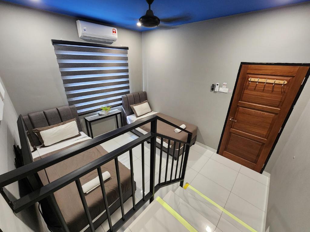 Posezení v ubytování Ipoh Eden Pool Villa Suites