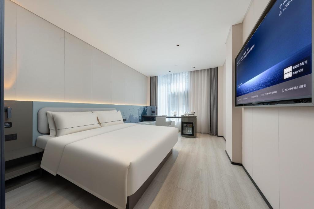 Postel nebo postele na pokoji v ubytování Atour Light Hotel Guangzhou Taikoo Hui Grand Plaza