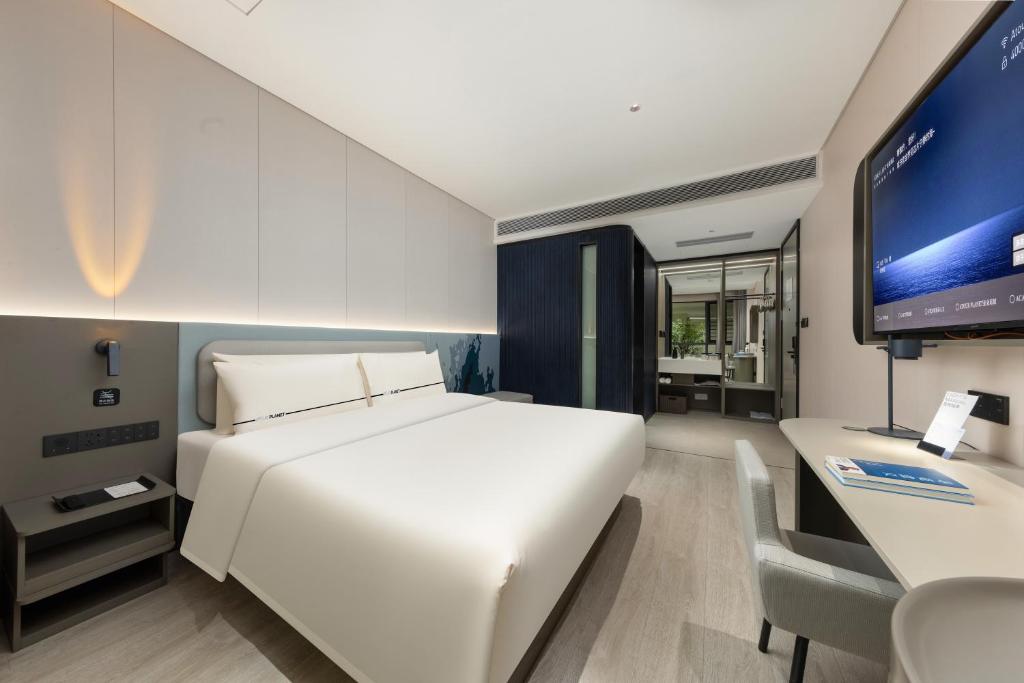 Postel nebo postele na pokoji v ubytování Atour Light Hotel Guangzhou Taikoo Hui Grand Plaza