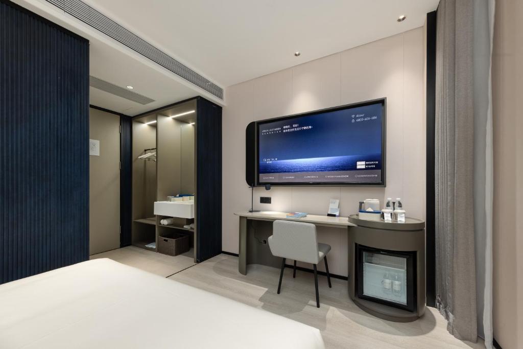Postel nebo postele na pokoji v ubytování Atour Light Hotel Guangzhou Taikoo Hui Grand Plaza