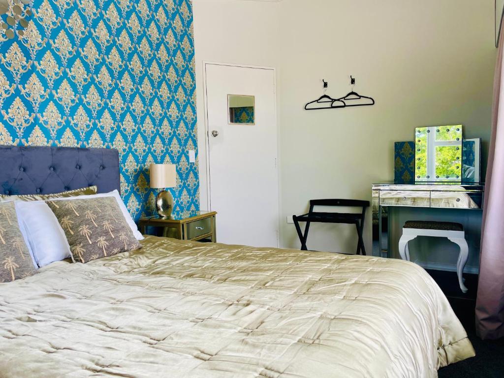 Postel nebo postele na pokoji v ubytování A1 Kaikoura Motel & Apartment