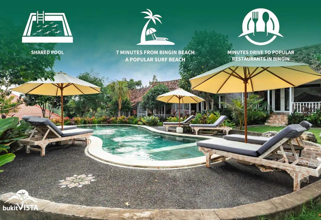 a pool with chairs and umbrellas in front of a house at D'Pendem Cottage's by Bukit Vista in Uluwatu