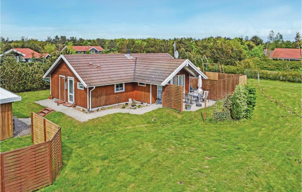 an aerial view of a house with a yard at Holiday Home Blomstervangen Ka Denm in Oksbøl