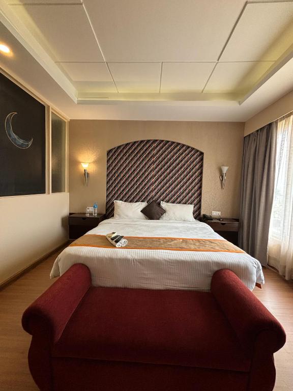 Postel nebo postele na pokoji v ubytování Palette 823 Hotel Ichchha