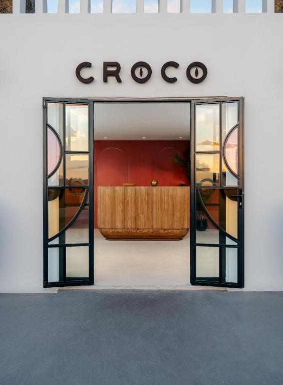 Postel nebo postele na pokoji v ubytování Croco Mykonos