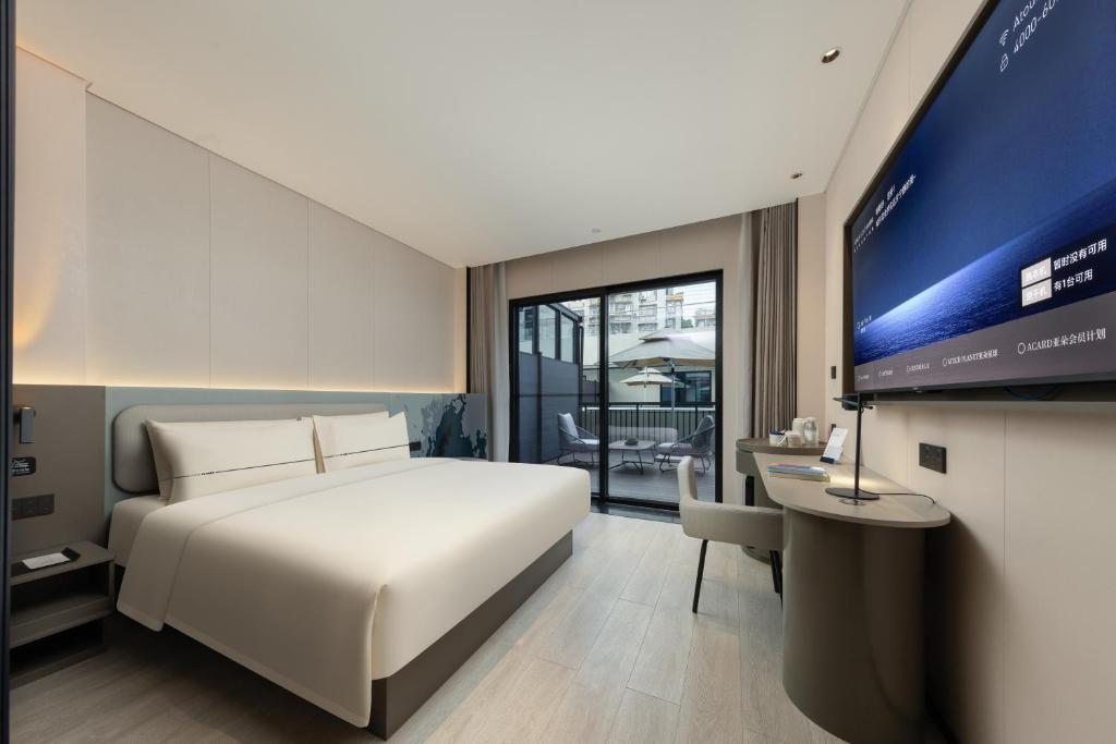 Postel nebo postele na pokoji v ubytování Atour Light Hotel Guangzhou Taikoo Hui Grand Plaza