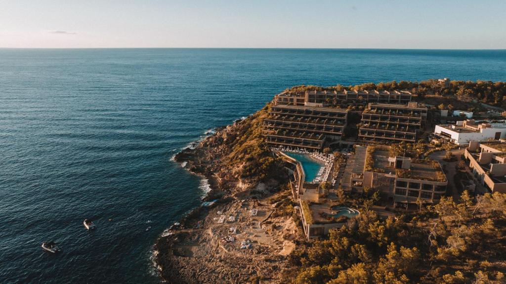 an aerial view of a resort by the ocean at Six Senses Ibiza in Portinatx