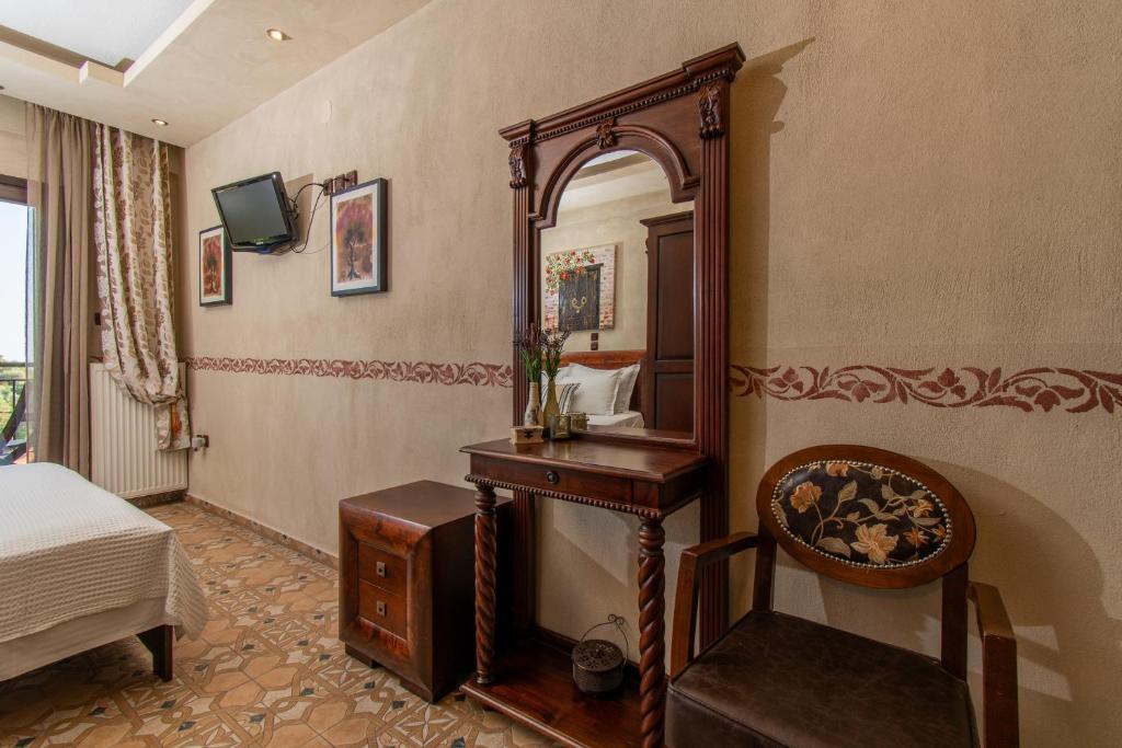 Postel nebo postele na pokoji v ubytování Oreiades Guesthouse