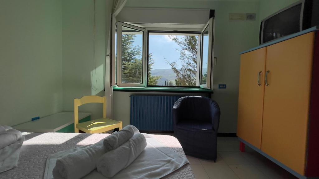 Postel nebo postele na pokoji v ubytování Hostel Villa Lucia