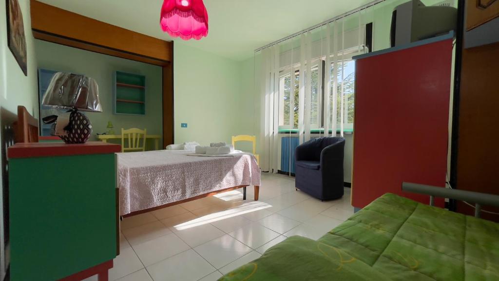 Postel nebo postele na pokoji v ubytování Hostel Villa Lucia
