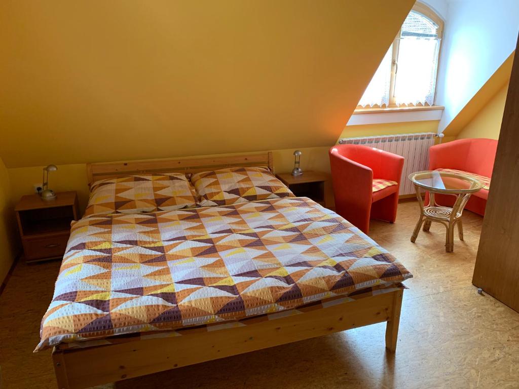 Postel nebo postele na pokoji v ubytování Penzion Rogallo