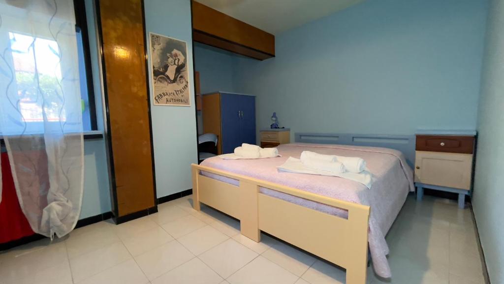 Postel nebo postele na pokoji v ubytování Hostel Villa Lucia