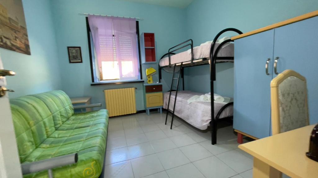 Postel nebo postele na pokoji v ubytování Hostel Villa Lucia