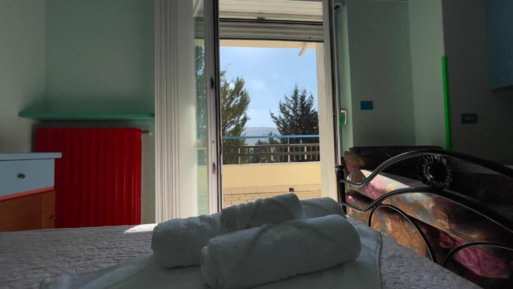 Postel nebo postele na pokoji v ubytování Hostel Villa Lucia