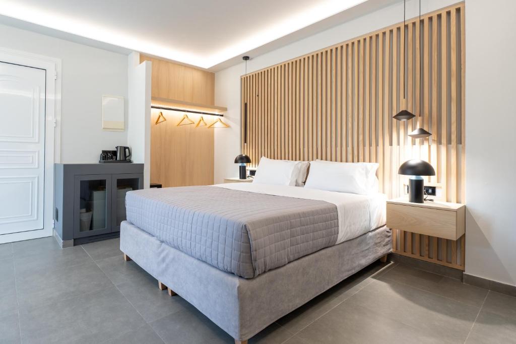Postel nebo postele na pokoji v ubytování Golden Sun Hotel