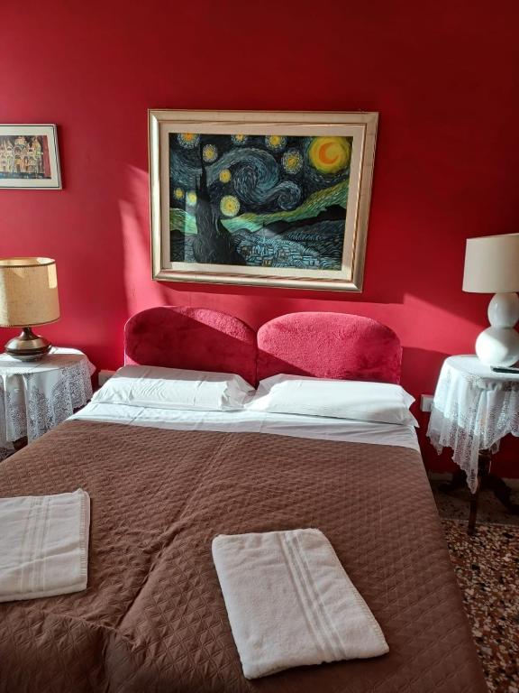 Postel nebo postele na pokoji v ubytování Residence Fortuny