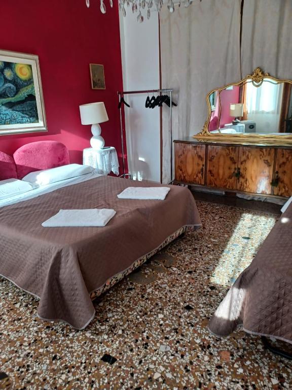 Postel nebo postele na pokoji v ubytování Residence Fortuny