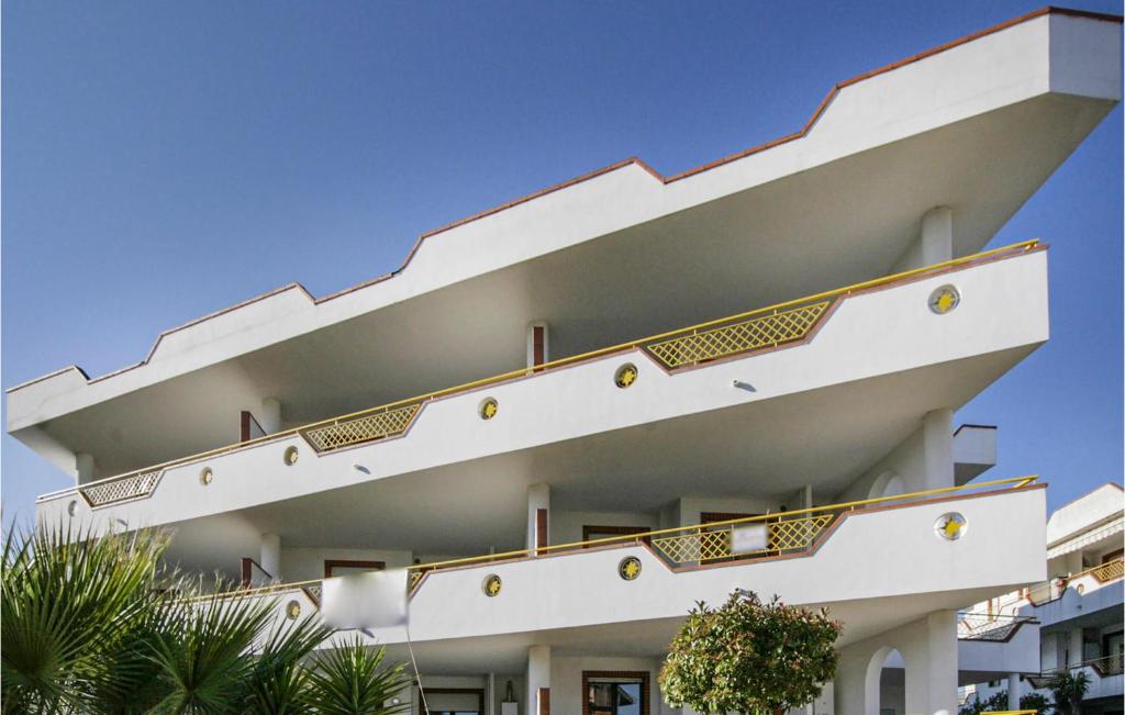 a building with balconies on the side of it at Bilo 2 in Alba Adriatica