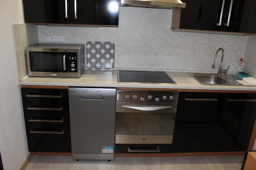 Kuchyň nebo kuchyňský kout v ubytování Apartmán Nerudova