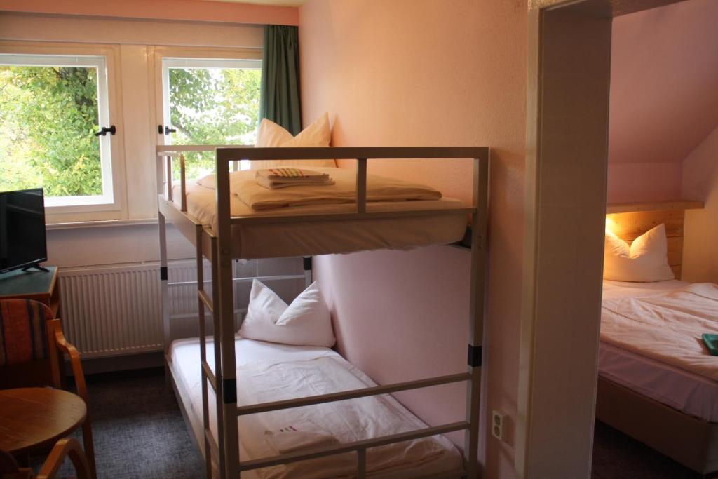 Postel nebo postele na pokoji v ubytování Ferienstudio