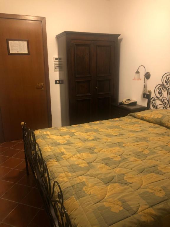 Posteľ alebo postele v izbe v ubytovaní Hotel Bucaneve
