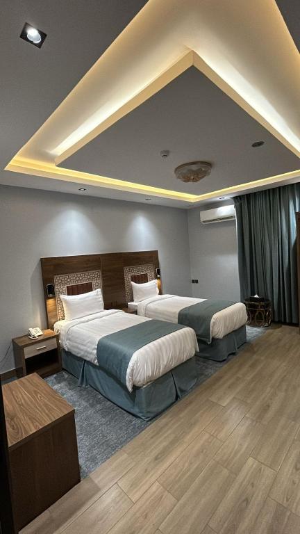 Postel nebo postele na pokoji v ubytování فندق ملاذ Malath Hotel