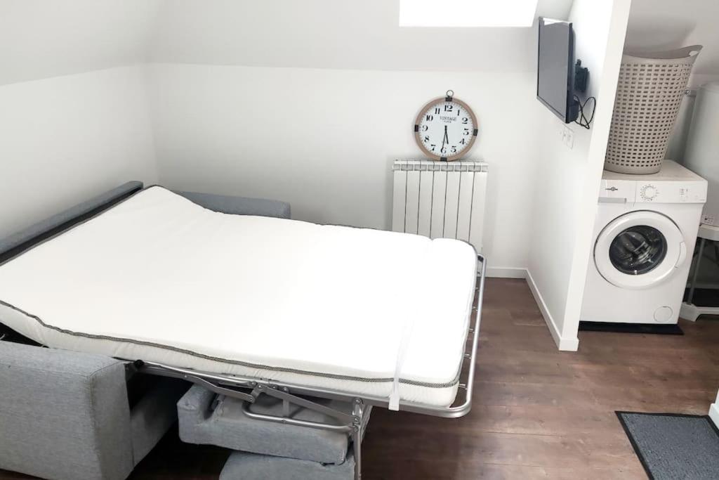 Katil atau katil-katil dalam bilik di Joli petit studio neuf idéalement situé Walibi 7 min