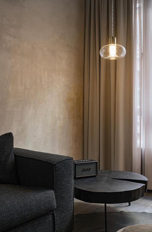 Posezení v ubytování Rooms by Wolfensson - Boutique Hotel