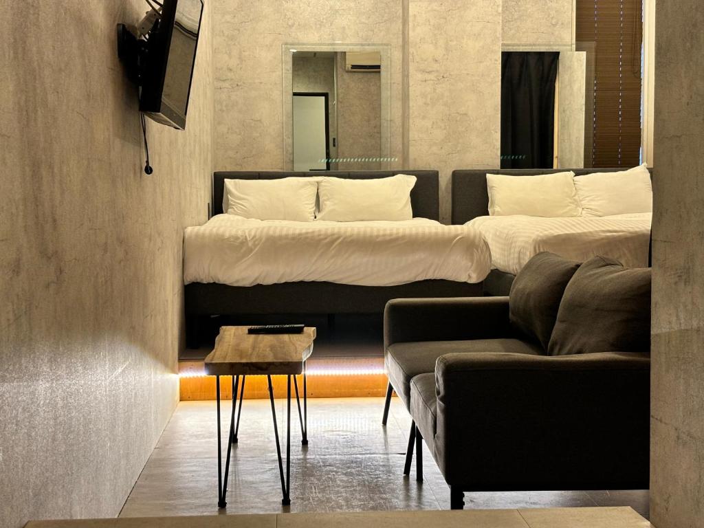 Ένα ή περισσότερα κρεβάτια σε δωμάτιο στο THE BEDROOM Imaizumi
