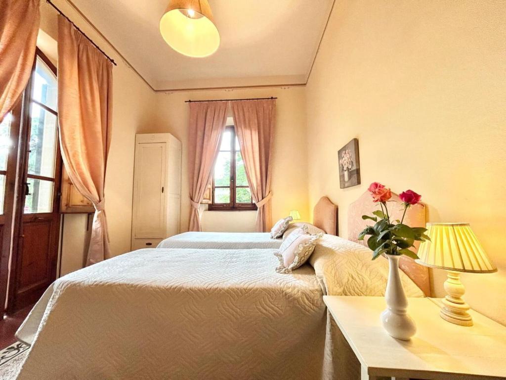 A bed or beds in a room at Villa Primula by PosarelliVillas