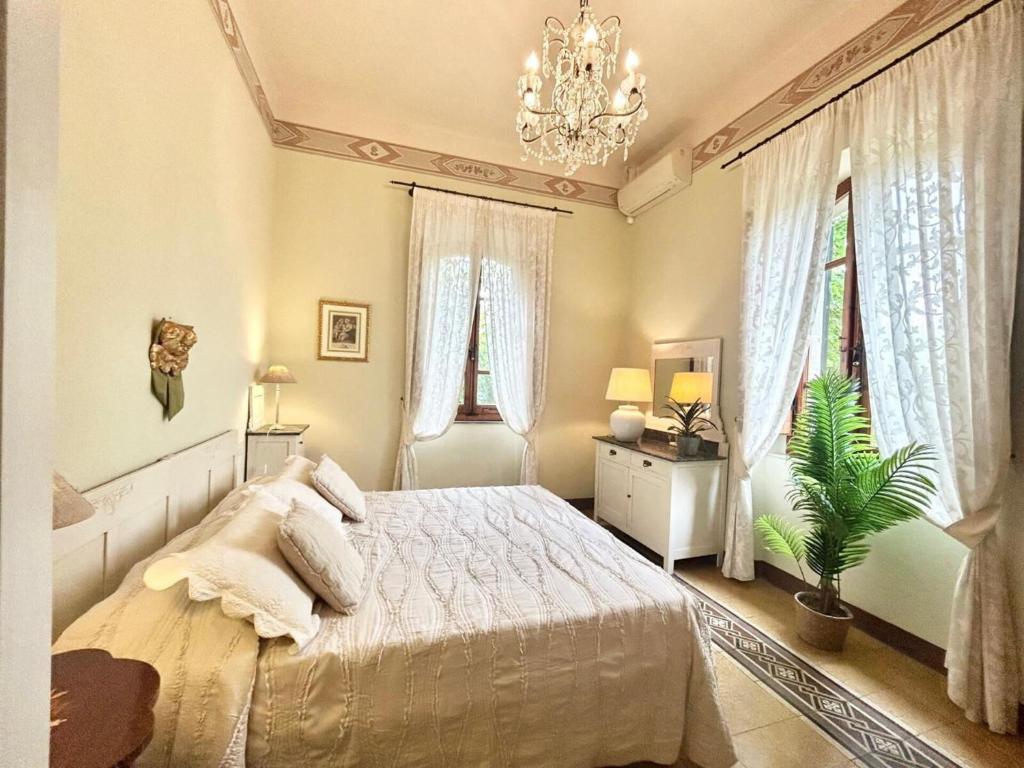 A bed or beds in a room at Villa Primula by PosarelliVillas