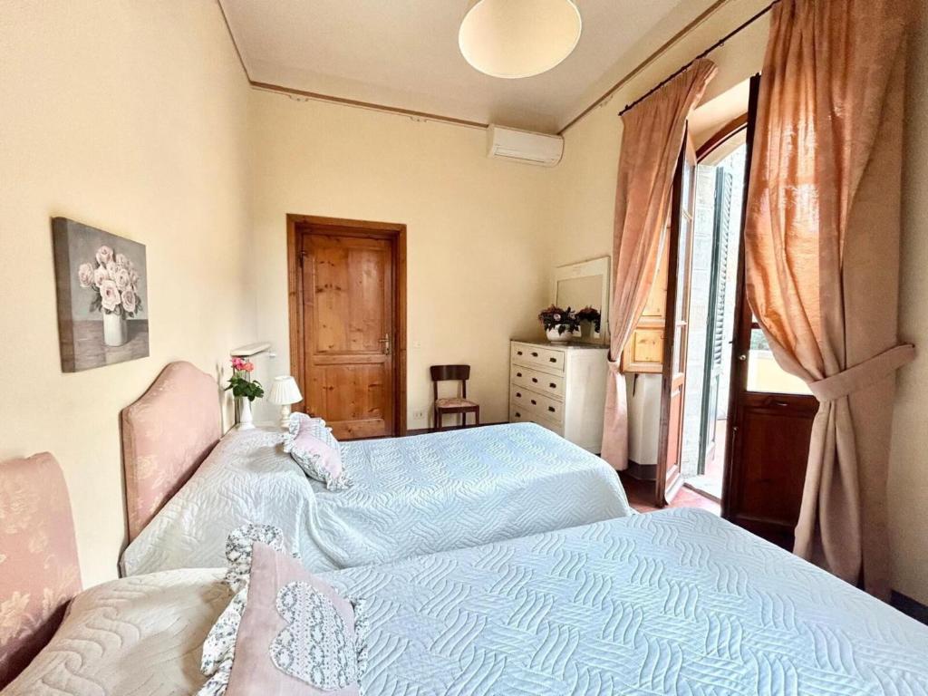 A bed or beds in a room at Villa Primula by PosarelliVillas