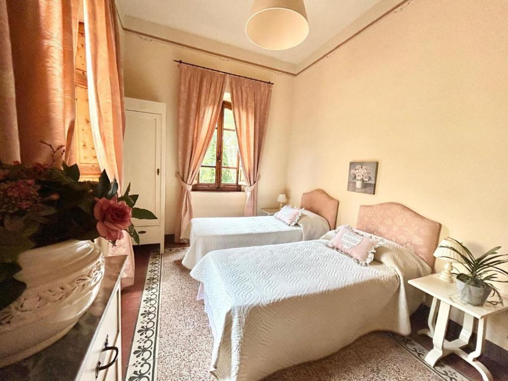 A bed or beds in a room at Villa Primula by PosarelliVillas