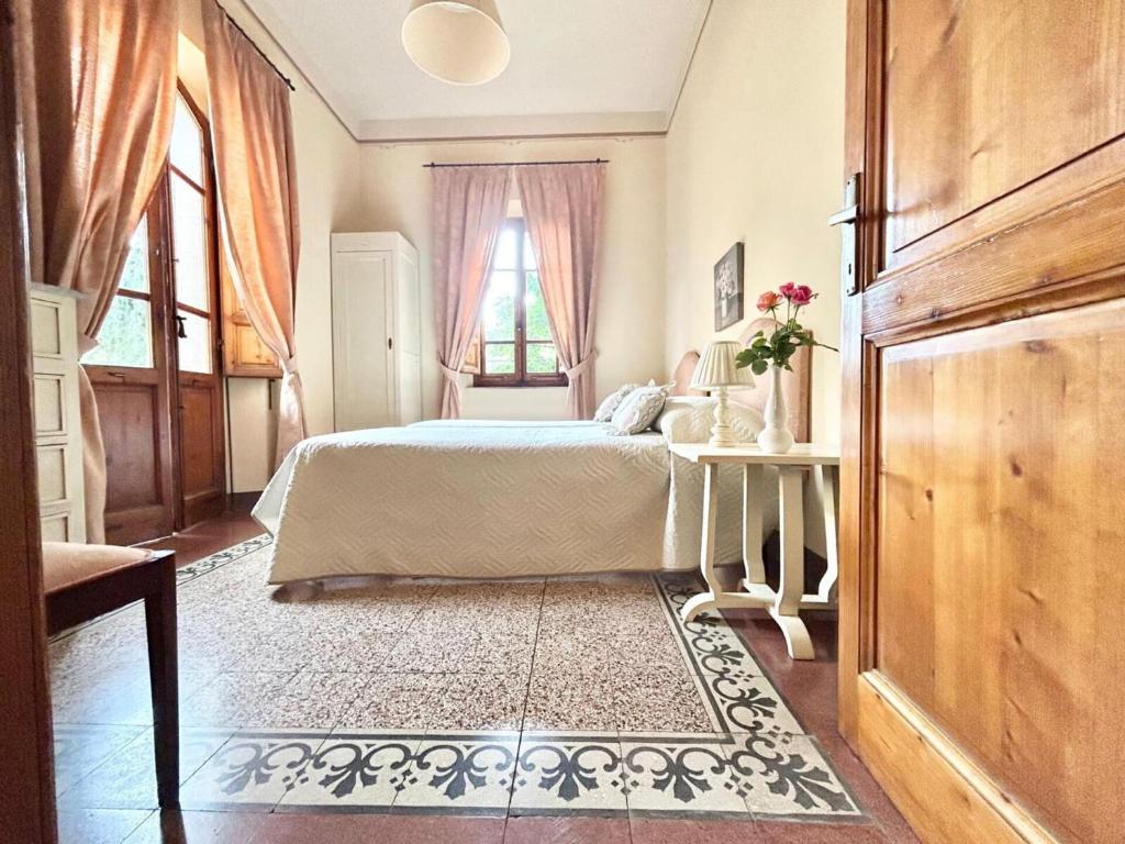 A bed or beds in a room at Villa Primula by PosarelliVillas