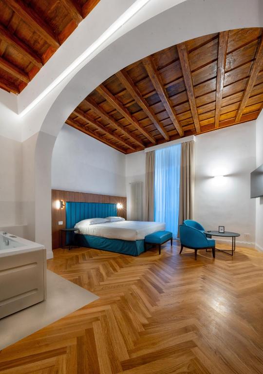 Postel nebo postele na pokoji v ubytování Albergo Abruzzi