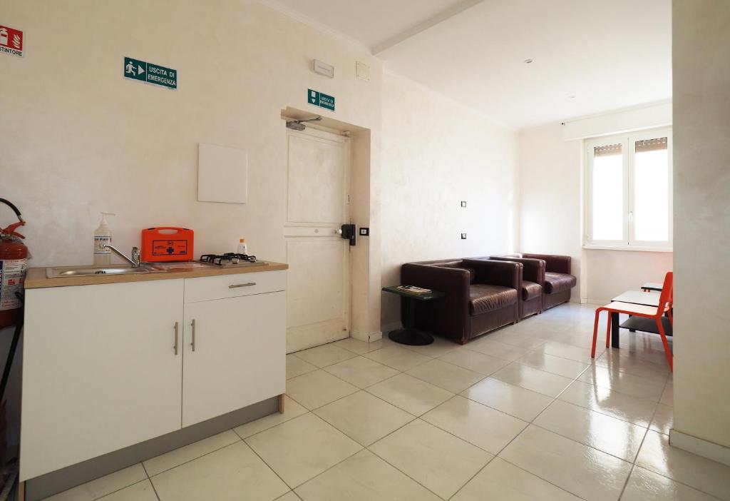Kuchyň nebo kuchyňský kout v ubytování Hotel Osimar