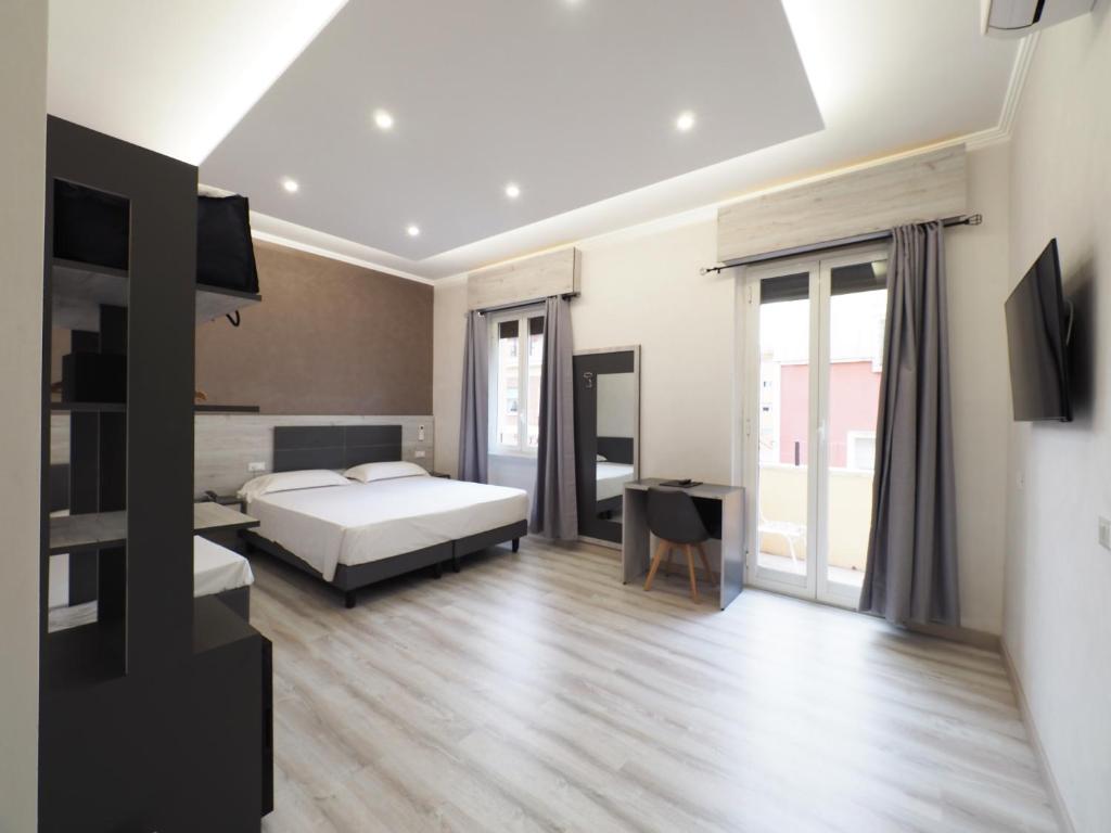 Postel nebo postele na pokoji v ubytování Hotel Osimar