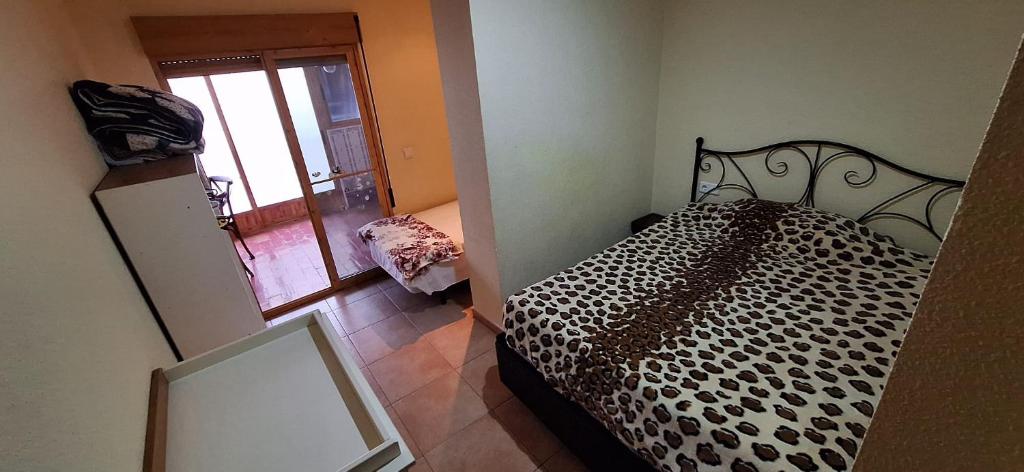 Postel nebo postele na pokoji v ubytování Apartamentos Casa May 2 - Centro Benidorm- Solo Mayores de 30 años y familias