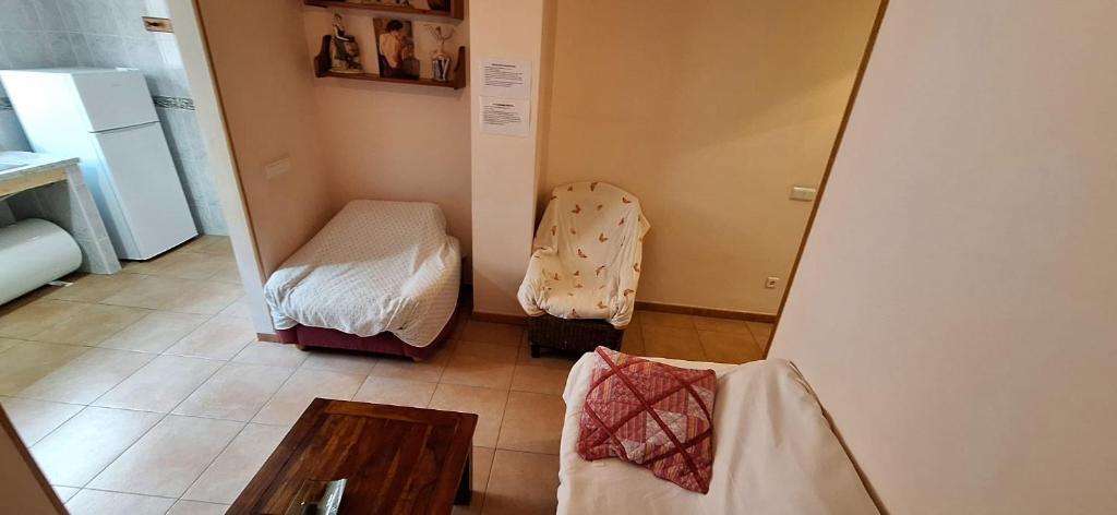 Postel nebo postele na pokoji v ubytování Apartamentos Casa May 2 - Centro Benidorm- Solo Mayores de 30 años y familias