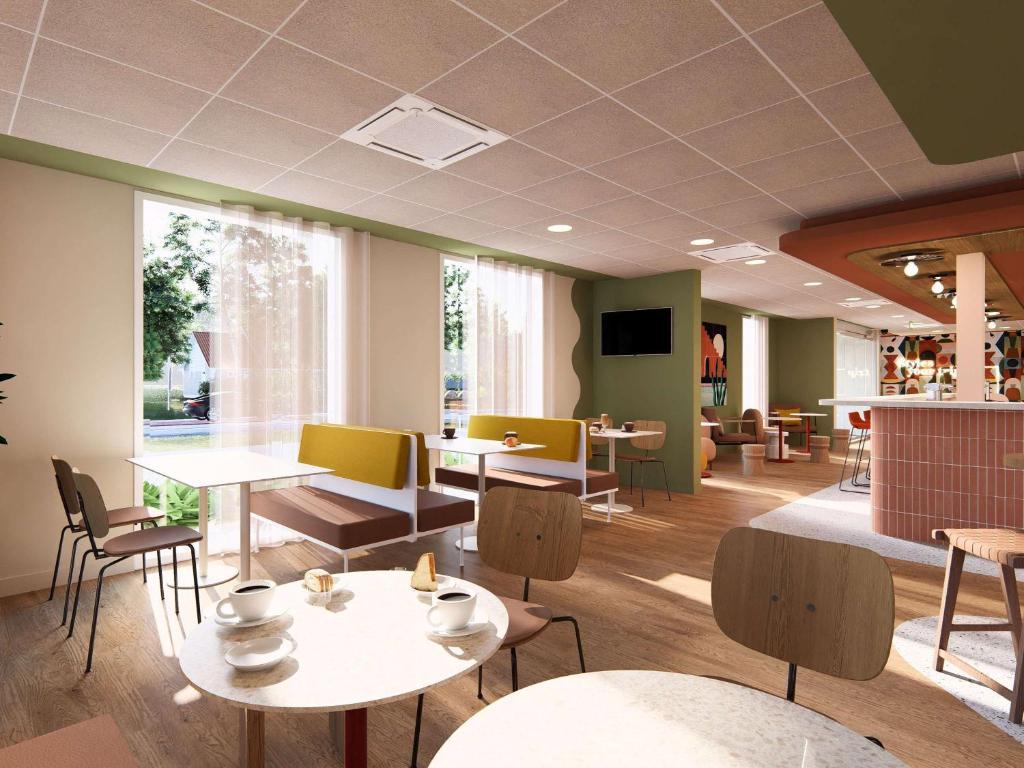 Posezení v ubytování ibis Styles Prévessin Genève Aéroport