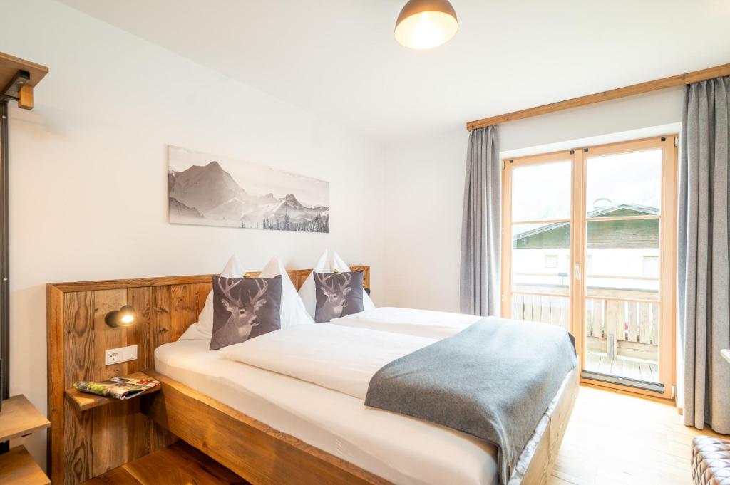 Postel nebo postele na pokoji v ubytování Chalet Hoamat Leben