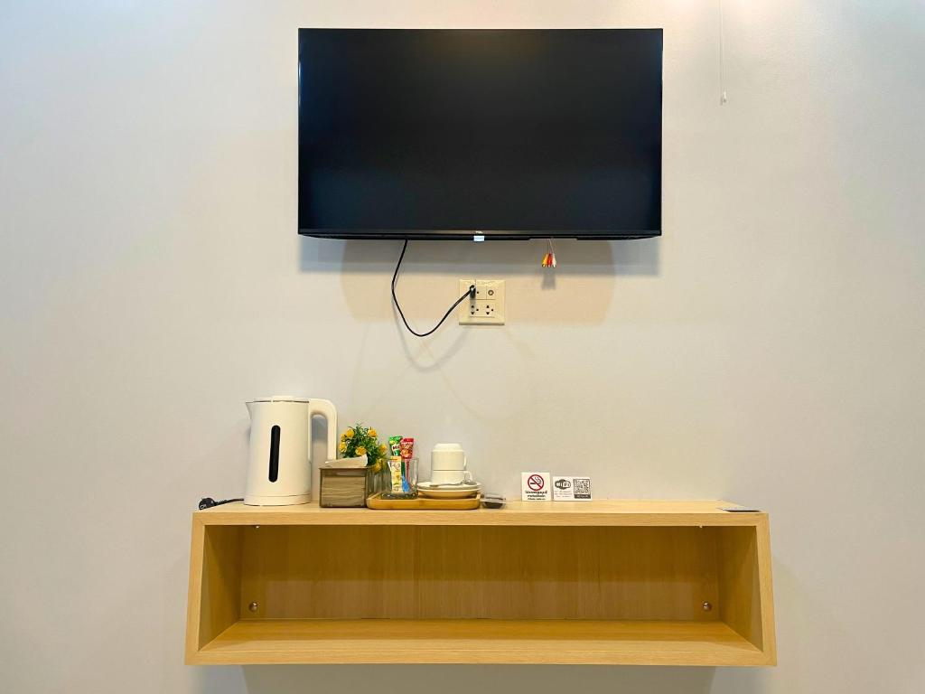 TV a/nebo společenská místnost v ubytování IBC Home ที่พักฮาลาล นครศรีธรรมราช