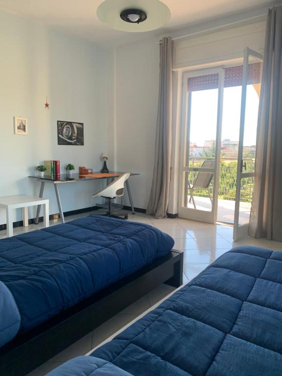 Postel nebo postele na pokoji v ubytování Vesuvius garden