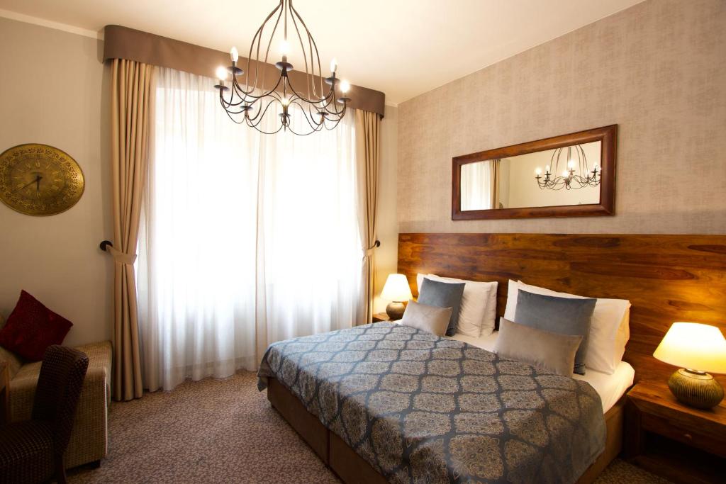 Postel nebo postele na pokoji v ubytování Hotel Residence Agnes